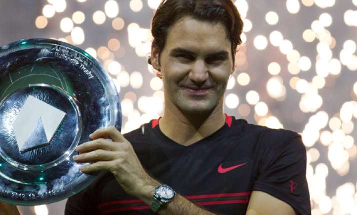 federer beats del potro to clinch abn amro title