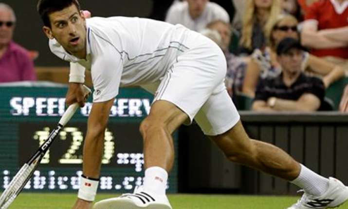 federer djokovic win at wimbledon wozniacki out