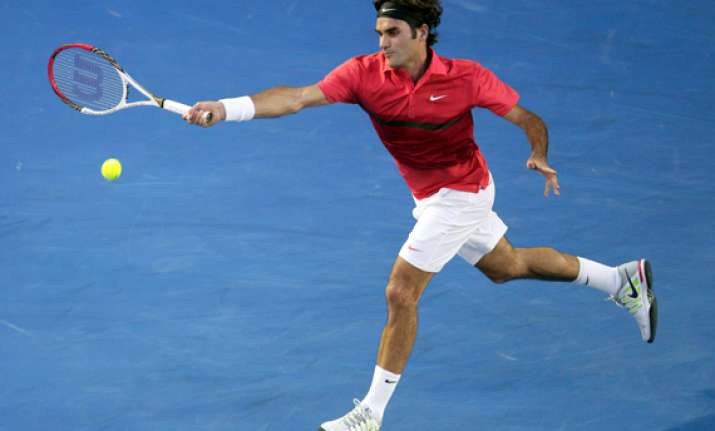 federer through to australian open quarterfinals