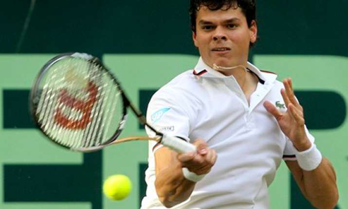 federer beats youzhny to reach 7th halle final