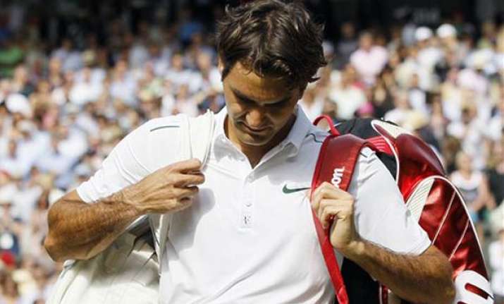 federer loses to tsonga in wimbledon quarterfinals