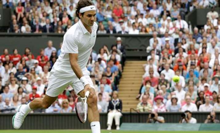 federer routs fognini in 2nd round of wimbledon