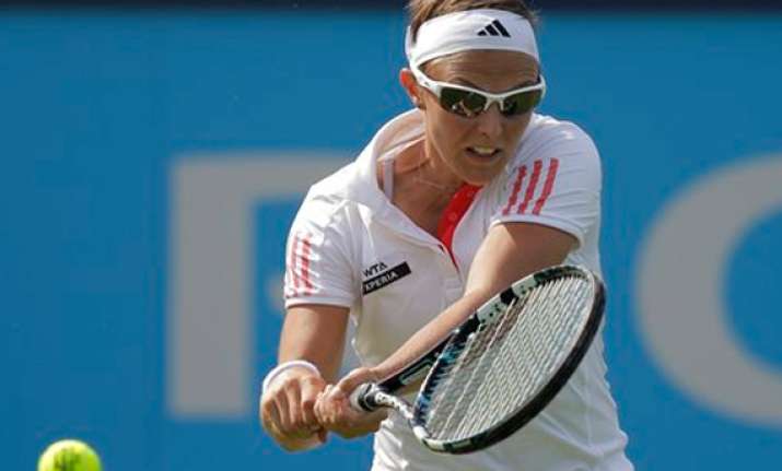 flipkens upsets stosur in 1st round at unicef open