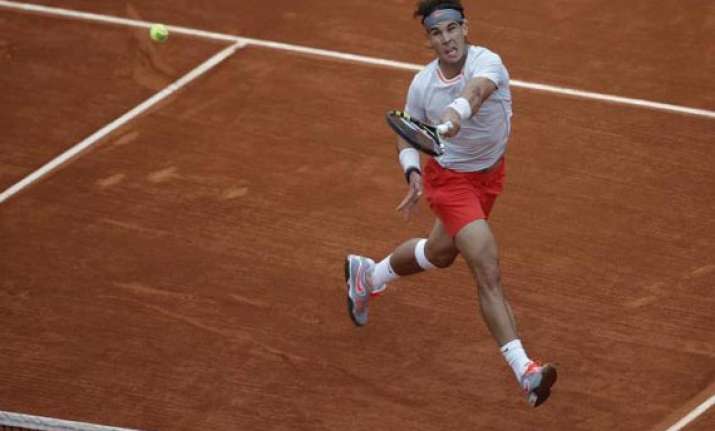french open rafael nadal advances to third round