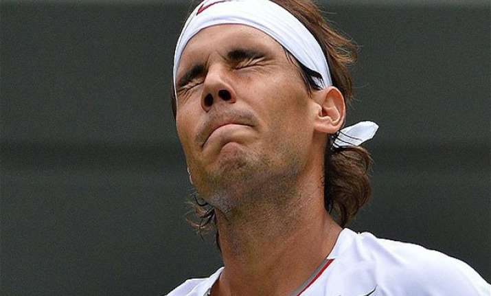 mcenroe says struggling nadal needs a new coach