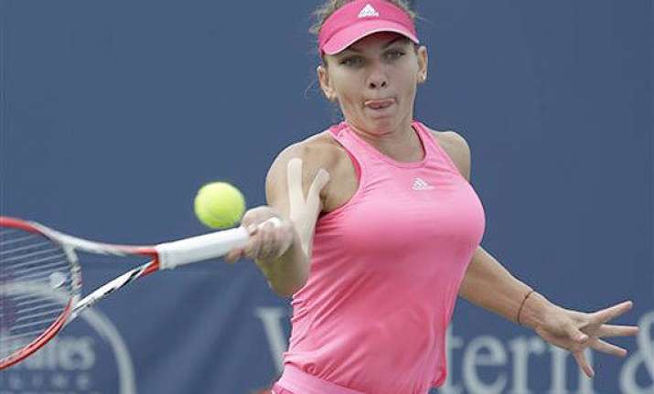 wta finals simona halep breezes past eugenie bouchard