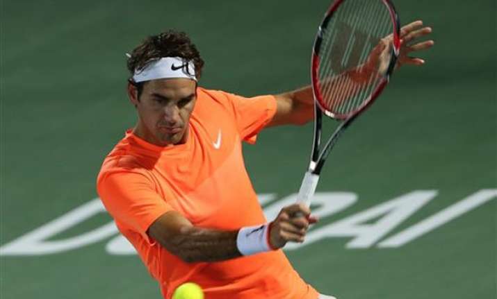 roger federer rallies to reach dubai quarters novak