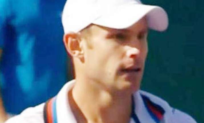 nadal through but roddick crashes out at queen s