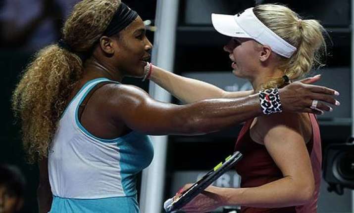 wta finals serena williams beats caroline wozniacki to