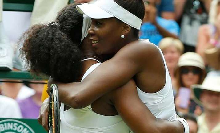 a win then a hug serena williams tops venus at wimbledon