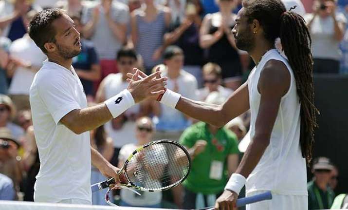 wimbledon 2015 dustin brown crashes out 2 days after
