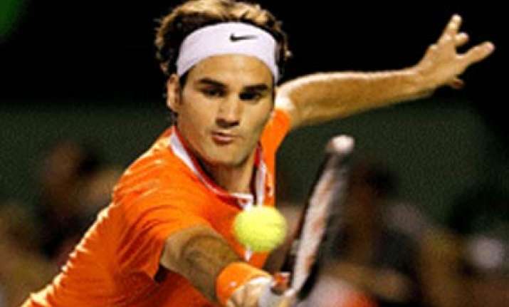 federer through in opening round murray crashes out