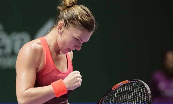 simona halep routs pennetta in opening match at wta finals