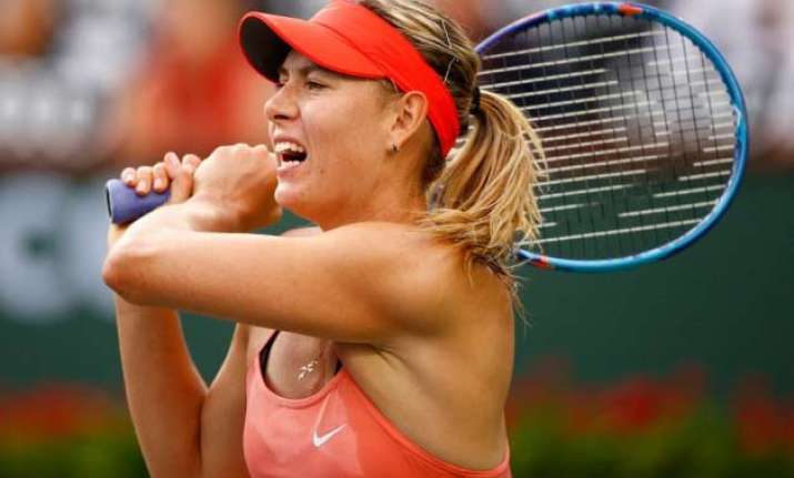 sharapova out federer serena nadal move on at indian wells