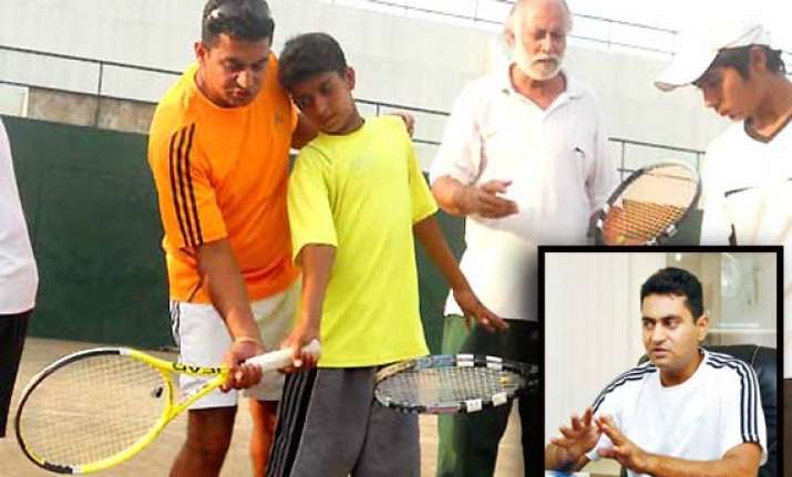indian birbal wadhera coaches budding tennis players in