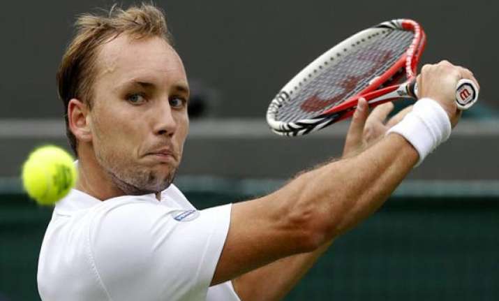 wimbledon isner giant killer darcis azarenka bow out