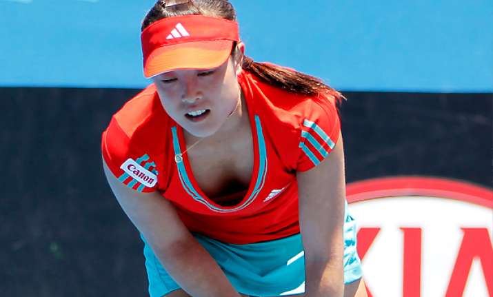 japan advances to playoffs at fed cup