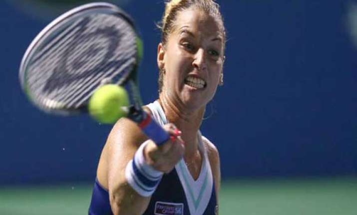 kanepi advances in stuttgart wozniacki pulls out