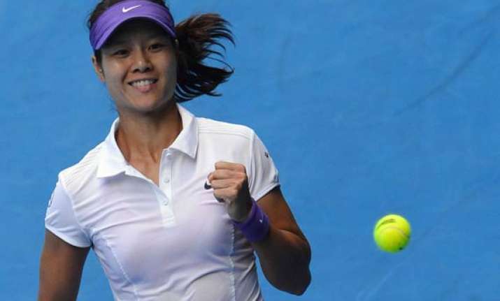 li na not at her best but into last eight in madrid