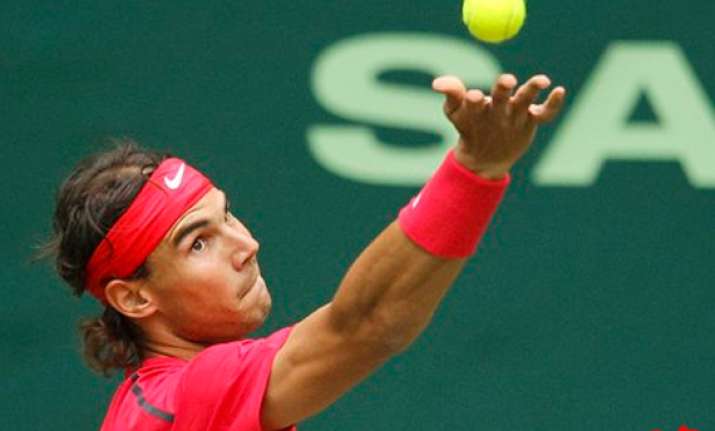 nadal loses in halle quarters federer wins