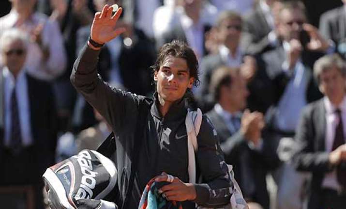 nadal tumbles into french open final