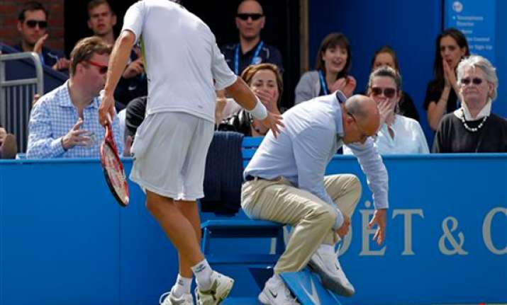 nalbandian disqualified after injuring line judge