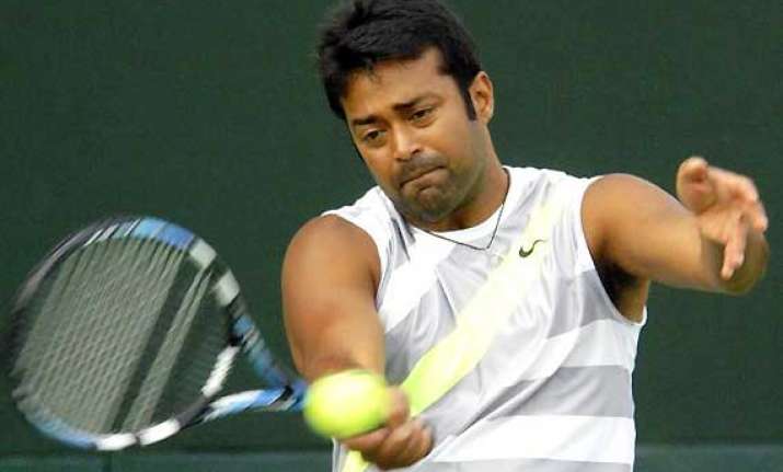 paes peya pair enters french open second round