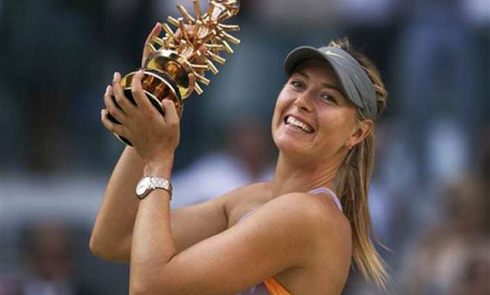 sharapova rallies to beat halep for madrid title