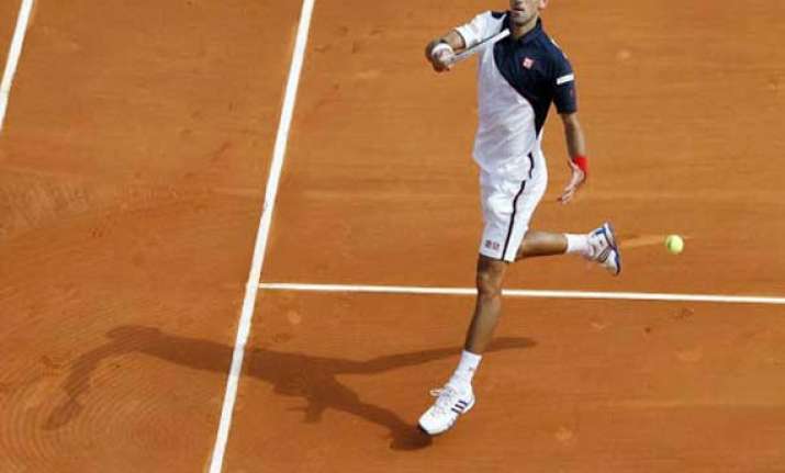 speedy djokovic eases into monte carlo 3rd round