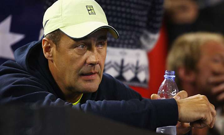 tomic s father banned by atp for alleged assault