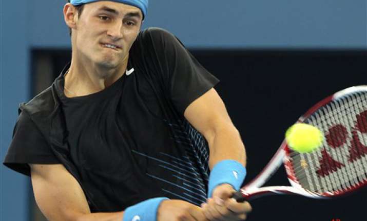 tomic into kooyong final with win over monfils