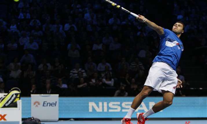 tsonga beats nadal to reach semis at atp finals