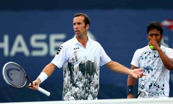 us open paes sania advance to the second round
