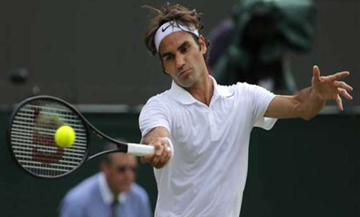 wimbledon federer back into quarterfinals for 12th time