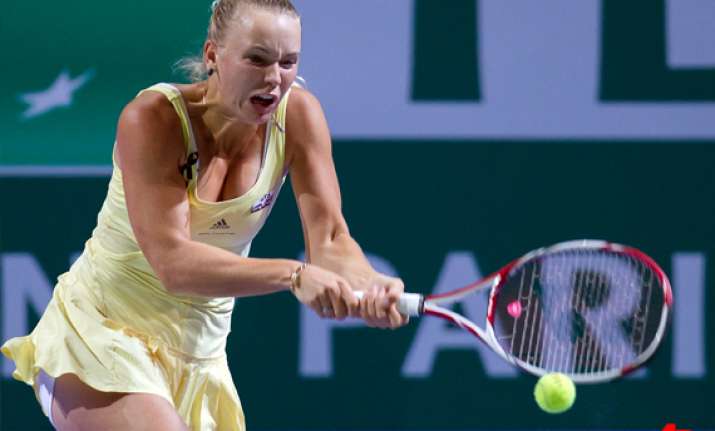 wozniacki seals no. 1 ranking as sharapova pulls out