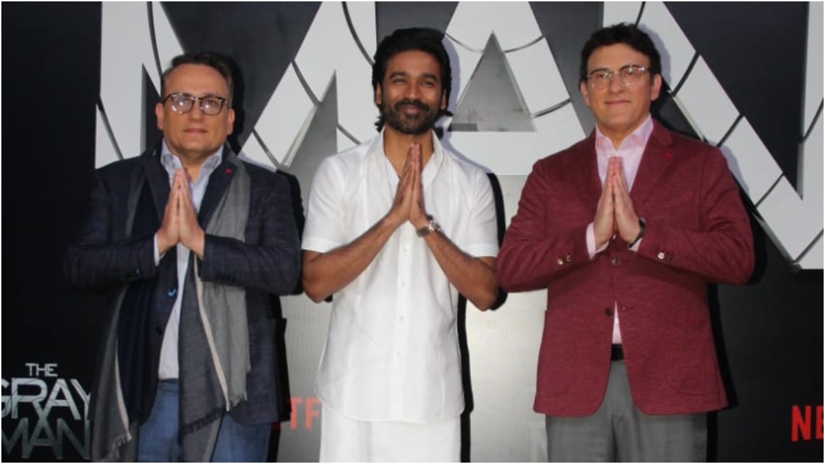 Dhanush Wears Veshti For 'The Gray Man' Mumbai Premiere, Poses