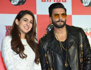 Ranveer Singh wears a black leather jacket and cool sunglasses