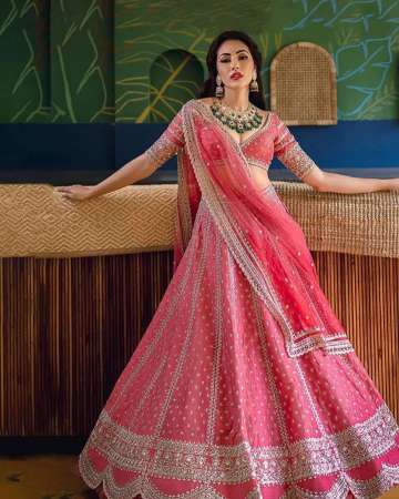 Exquisite Red Color Bridal Lehenga With Flower Embroidery And Mirror Work  On Velvet at best price in Surat
