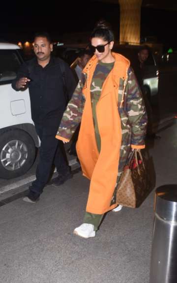 Deepika Padukone makes a stylish appearance in long camouflage jacket at  airport