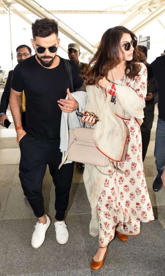 Anushka Sharma, Virat Kohli leave for Mumbai after Delhi reception. See ...