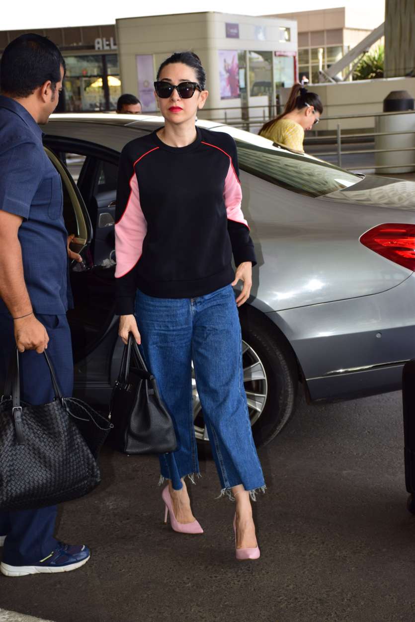 Kareena Kapoor takes airport fashion up a notch in baggy hoodie and jeans.  See pics - India Today