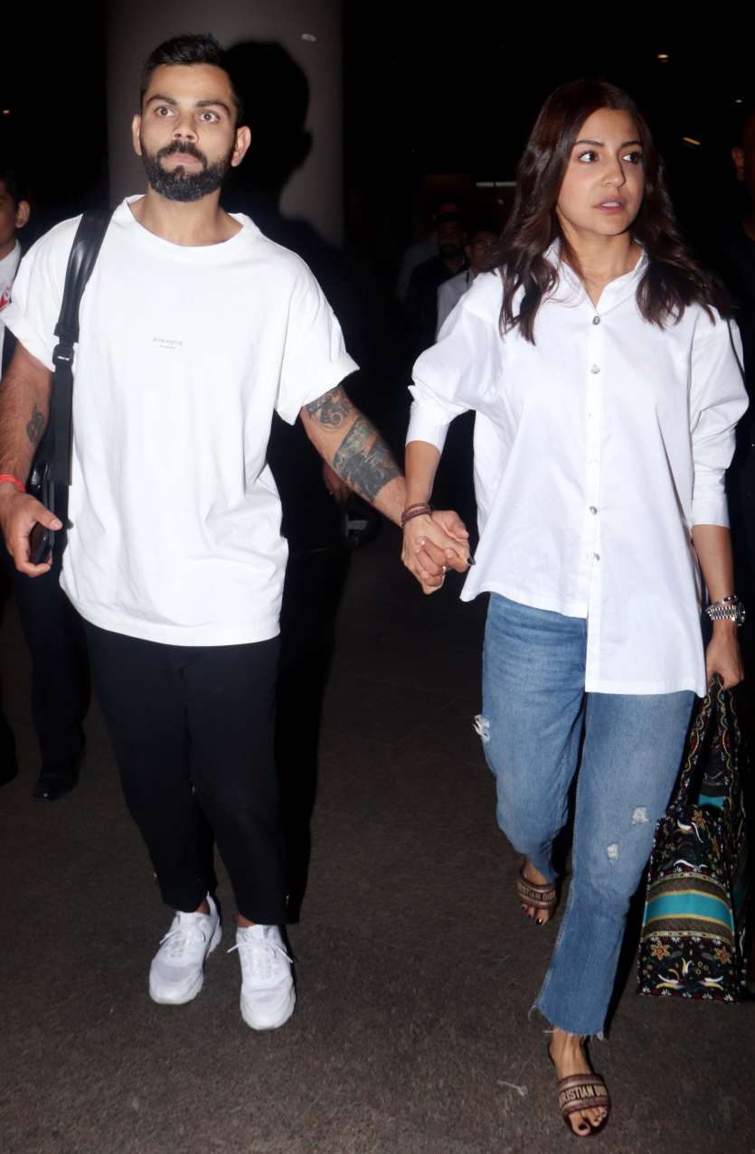 Airport Spotting: Virat-Anushka walk hand-in-hand, Aishwarya Rai ...