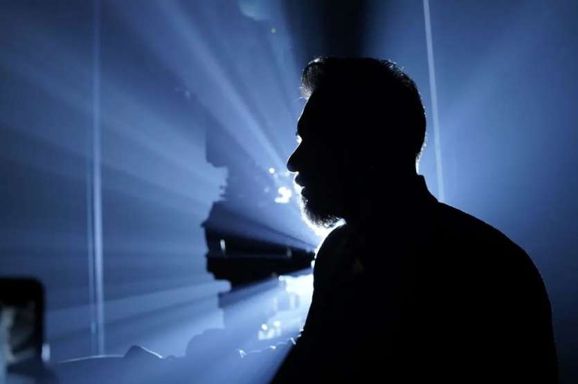 'Bhuj' actor Ajay Devgn took to his Instagram handle and shared a silhouette picture, in which he could be seen posing in a dimly lit frame with a mounted camera and lights in the background. The backlit rays in the image formed an aura around the star, giving the entire frame a poetic touch. In the post's caption, Ajay wrote, 