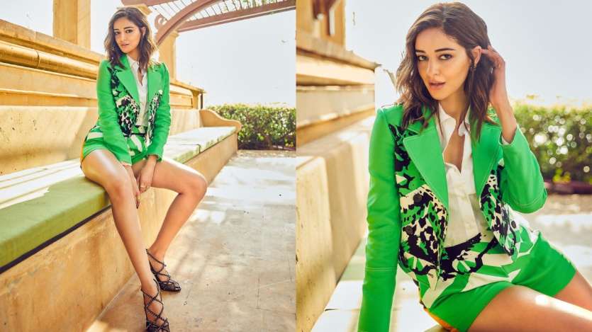 Ananya Panday looks sassy in this green bossy dress with a pair of black heels and perfectly curled locks. 