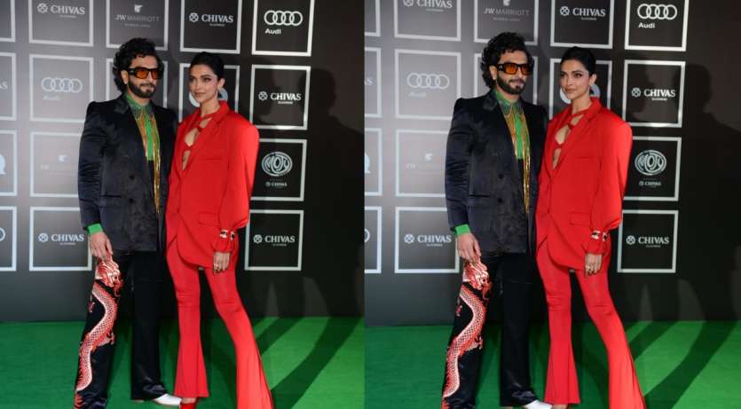 Ranveer Singh in dragon pants and Deepika Padukone in red outfit