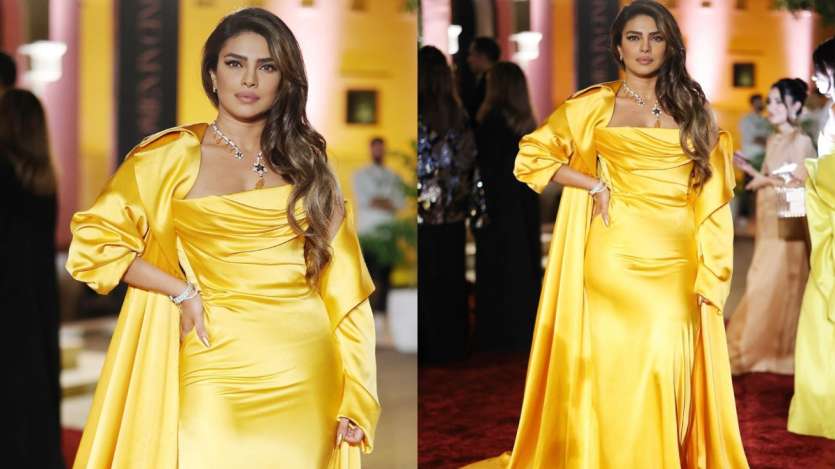 She totally carries off the shades of yellow gracefully. Look at her bright yellow gown with that cat-eye look.