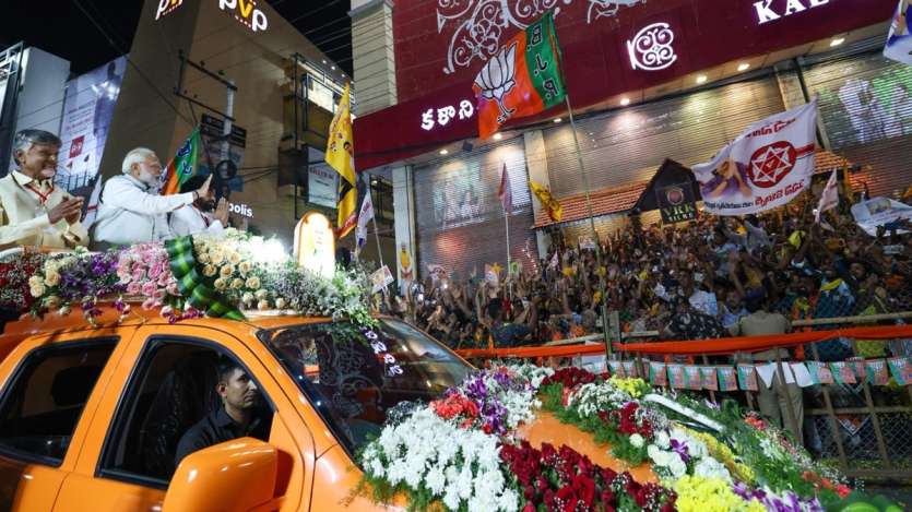 PM Modi, Chandrababu Naidu and Pawan Kalyan's supporters, in huge numbers, gather on both sides of the road to get a glimpse of the trio. 