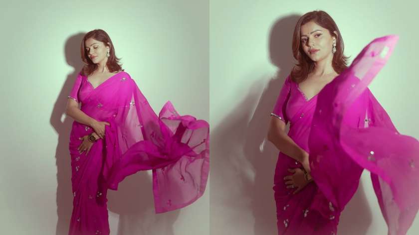 Rubina brings her signature charm in a pink saree set against a lush green backdrop. Her calm yet charismatic poses show how powerful simplicity can be when done right.