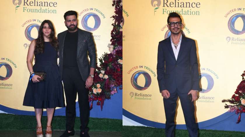 Indian cricketer Rohit Sharma was seen with his wife Ritika Sajdeh at the United in Triumph event, held to honour India's sporting heroes. Yuzvendra Chahal was also spotted posing for pictures.
