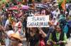 The faithful, a large number of them women, urged the